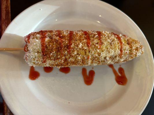 Street Corn covered in chile