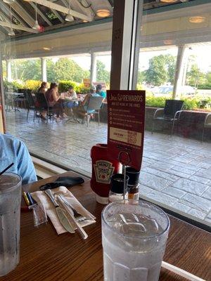 Outside seating at 99 Centerville location; not too bad when parking lot is quiet