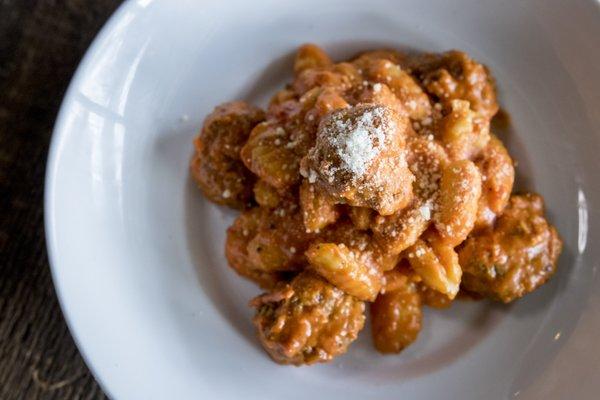 "GNOCCHI" Homemade meatballs, pecorino romano, Bellini's marinara cream sauce