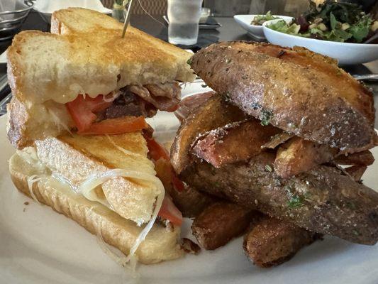 Homemade bread makes a fabulous grilled cheese, tomato, and smoked apple bacon sandwich, with their incredible wedge fries..!