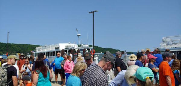 Mind the cue, a line half an hour before boarding