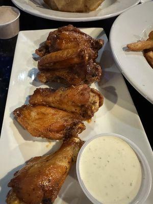 Hot BBQ wings and ranch.