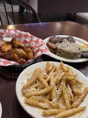 Cheese fries, wings, and jerk chicken