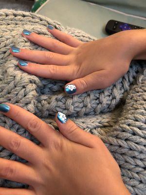 My daughters nails with designs.