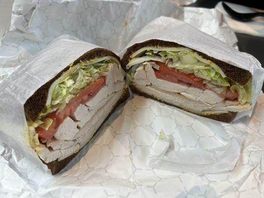 Hand Carved Turkey sandwich on Pumpernickel. Yum!