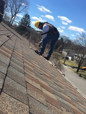 Alex measuring out a roof