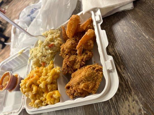 Shrimp & Chicken combo with potato salad and macncheese yummy