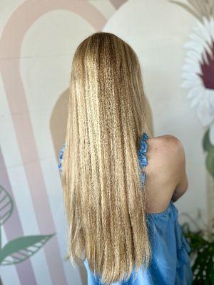 Radiant blonde full highlight on long hair