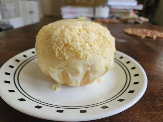 Cheesy ensaimada on a plate