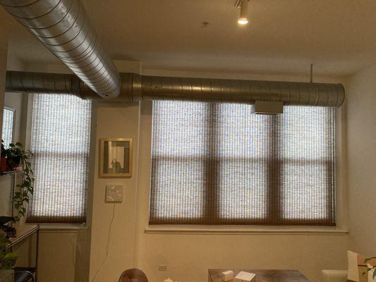 Motorized Woven Woods with light filtering roller shade for privacy. Hunter Douglas.                          Uptown, Chicago