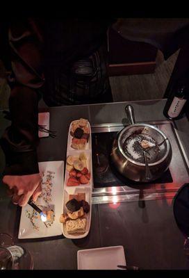 Chocolate fondue with birthday candle