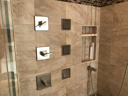 Kohler fixtures, with water tiles.