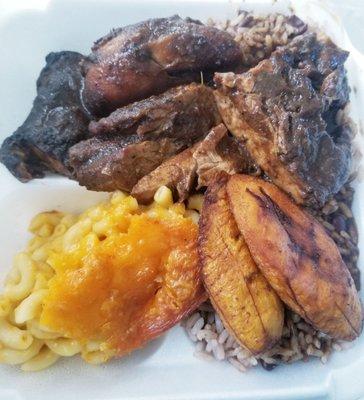 Jerk chicken. black beans and rice with mac  n cheese!!!