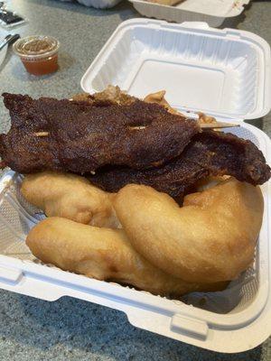 Chicken fingers, beef teriyaki, crab Rangoon and rice.