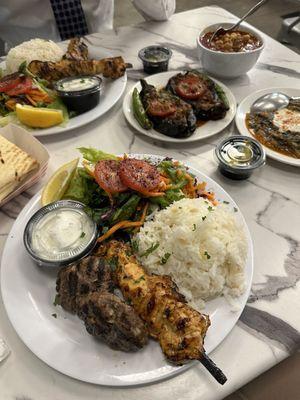 Chicken and meatball kebab, eggplant stuffed ground beef, sautéed spinach with yogurt, Turkish pozole, and chicken kebab