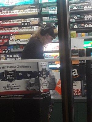 Weekend graveyard employee Maverik #197 wearing headphones.