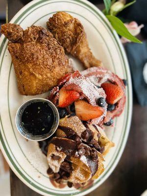 Spicy chicken, red velvet and chocolate chip waffles