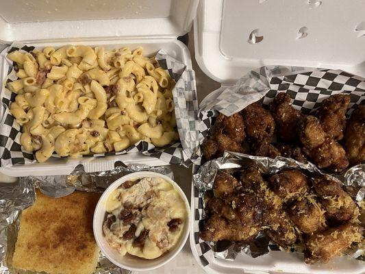 Bacon Mac and cheese, lemon chicken and soy garlic chicken, cornbread and grandmas banana pudding with candied pecans