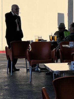 These guys smoking within 10ft of restaurant entrance. WTF