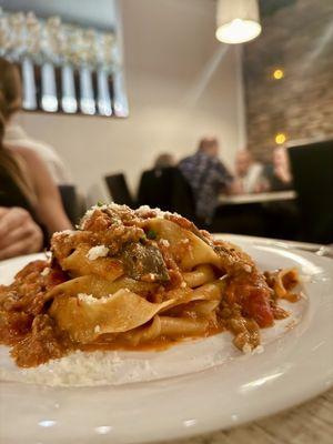 Lamb Sugo Tagliatelle  Seasonal Mushrooms, Pomadoro, Red Wine & Pecorino