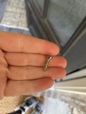 The tiny screws that were used to hang a massive front door....