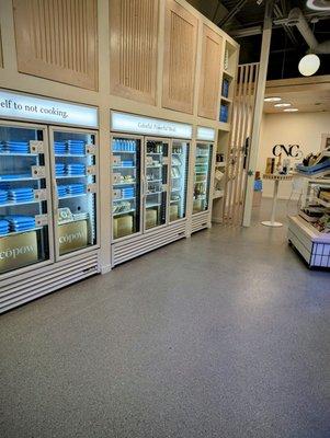 Labeled fridge filled with ready to eat healthy meals