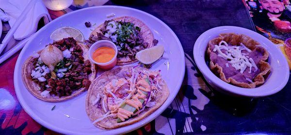 Amazing tacos!  Steak, steak and chorizo, and shrimp