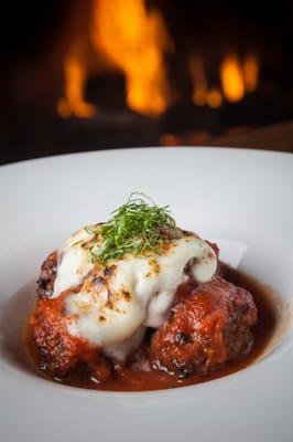 The ultimate comfort food... wild game meatballs with melted Gioia mozzarella, garlic marinara, and basil