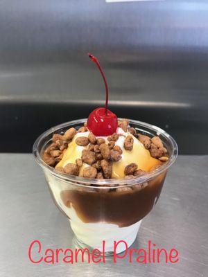 Carmel praline sundae: hot caramel and candy coated praline pecans