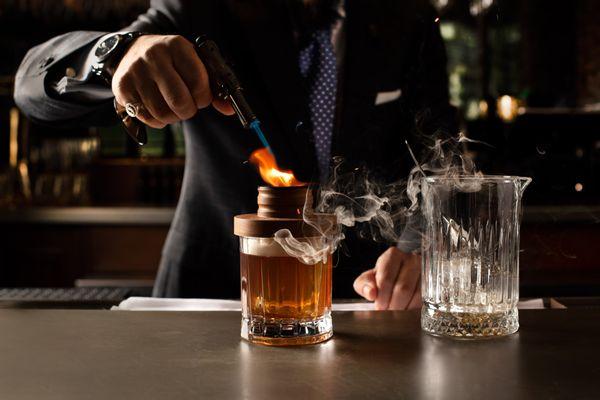 Our Applewood Smoked Old Fashioned uses a smoketop to infuse the wonderful aromas into your cocktail