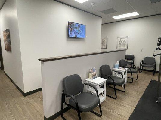 Waiting area in the rehab area.  We have exercise equipment and stretch machines for you to use while you wait for the doctor!