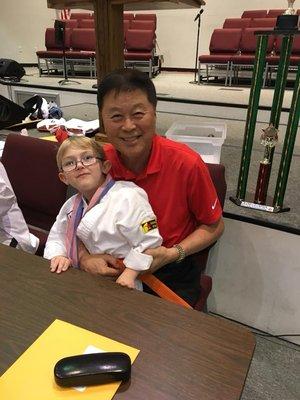 Our Grandmaster Y.S. Chung, 9th Degree Black belt, Owner/President of the ATF, and our student Christopher