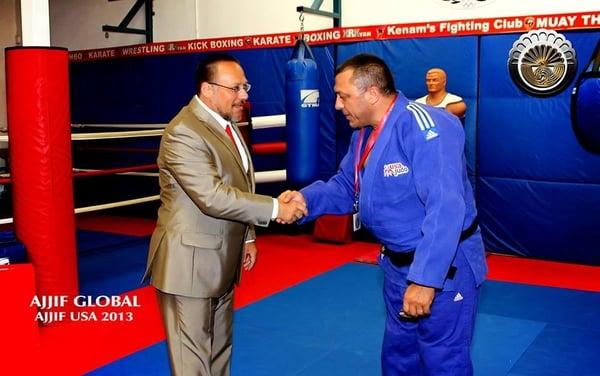 Coach Aram receiving AJJIF certification