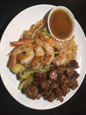 Combination plate with shrimp, steak, and fried rice