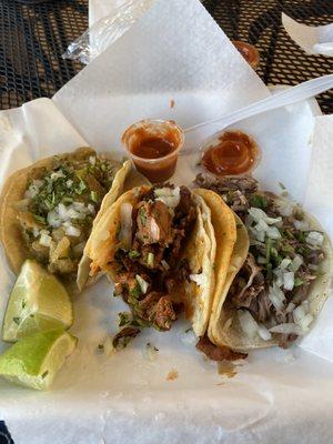 3 tacos. Chicharrón en salsa, barbacoa and pastor