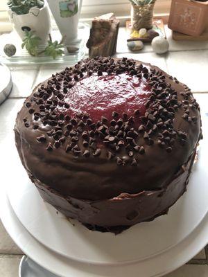 Our daughters birthday cake requested raspberry and chocolate ganache