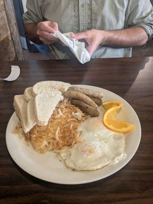 Breakfast plate with sausage links and toast