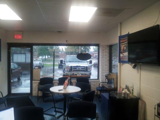 Shot of the inside of the waiting room/front of the shop.