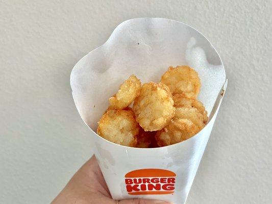 Hashbrowns. These little coin-sized bites are fried to a golden brown crisp with a soft interior.