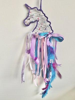 This charming unicorn dream catcher is so magical.