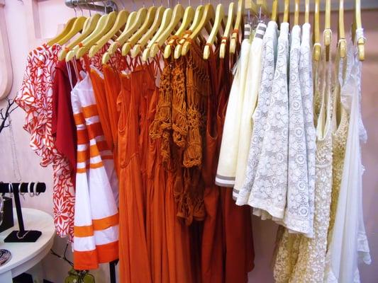 Just one of the clothing racks in the store. (Organized by colors)