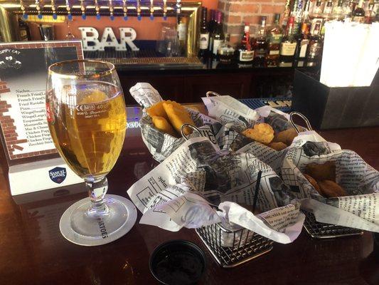 MAC N CHEESE BITES FRIED RAVIOLI CHICKEN FINGERS AND EMPANADAS !!! AND DON'T FORGET THE STELLA !!! EXACTLY WHAT I NEEDED !!!