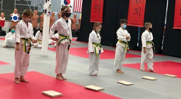 First breaking experience for these yellow/green belts.  A terrific part of the journey