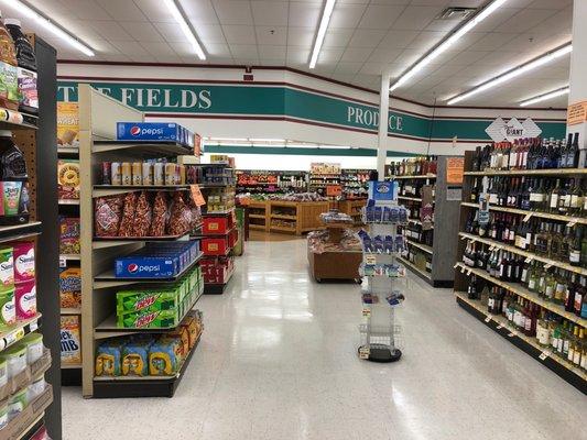 Inside store facing produce.