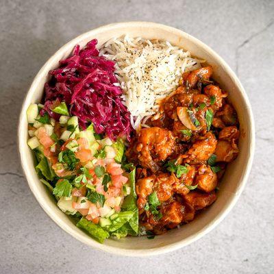 Chicken Stew - Organic chicken mushroom stew with basmati rice, romaine, tomato, cucumber, and fresh herb labneh dressing