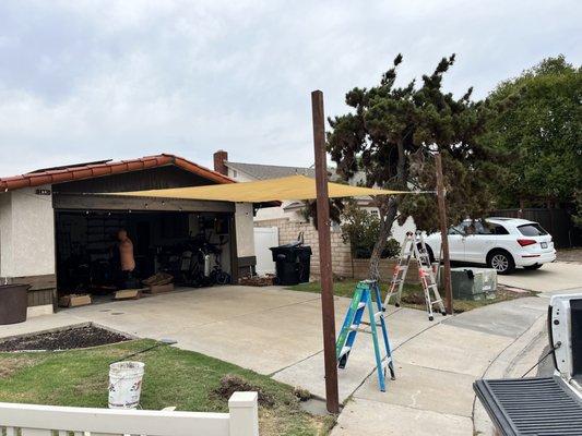 Sun sail shade driveway job