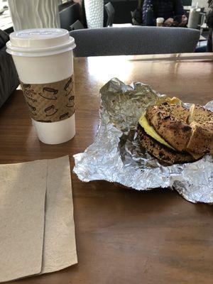 Latte - Large (20oz) and breakfast bagel sandwich.