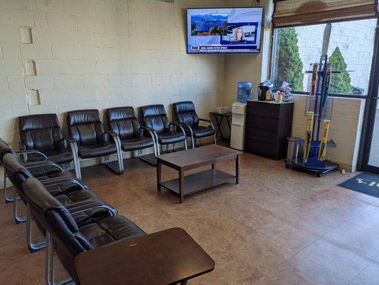 Our waiting room where costumers can get comfortable, watch tv, make some coffee, hot chocolate, or soda while we take care of their car.