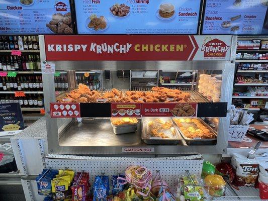 Freshly fried chicken, biscuits and potato wedges.