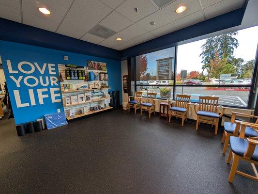 Lobby and reception with retail wall